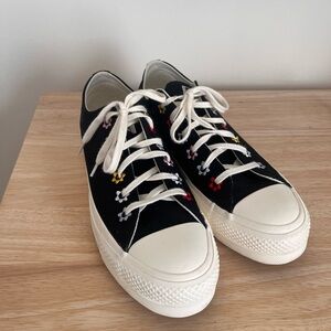 Converse Black Canvas Sneakers with White Soles and Multicolor Flower Details